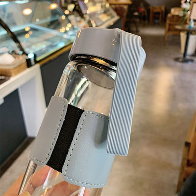480 ml de garrafa de água de vidro de borosilicato personalizada com manga de couro e infusor de chá